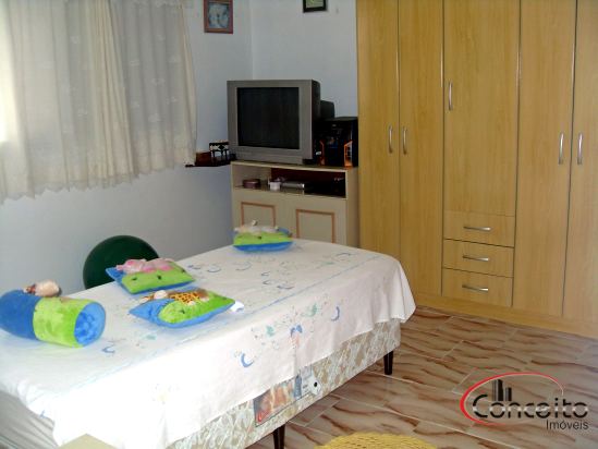 Casa com ponto comercial na área central de Ubatuba!